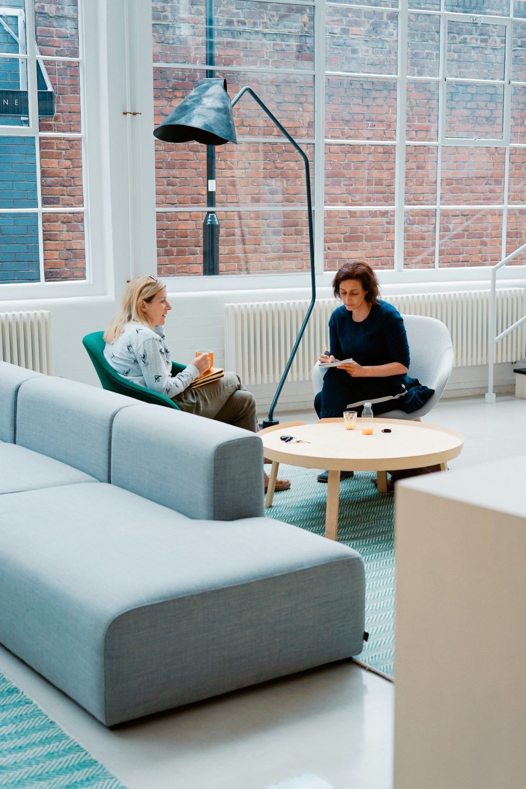 A coaching conversation between two professionals